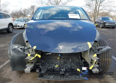 2023 Tesla Model Y Awd/Long Range Dual Motor All-Wheel Drive z USA, uszkodzony, nr VIN 7SAYGDEE2PA103779